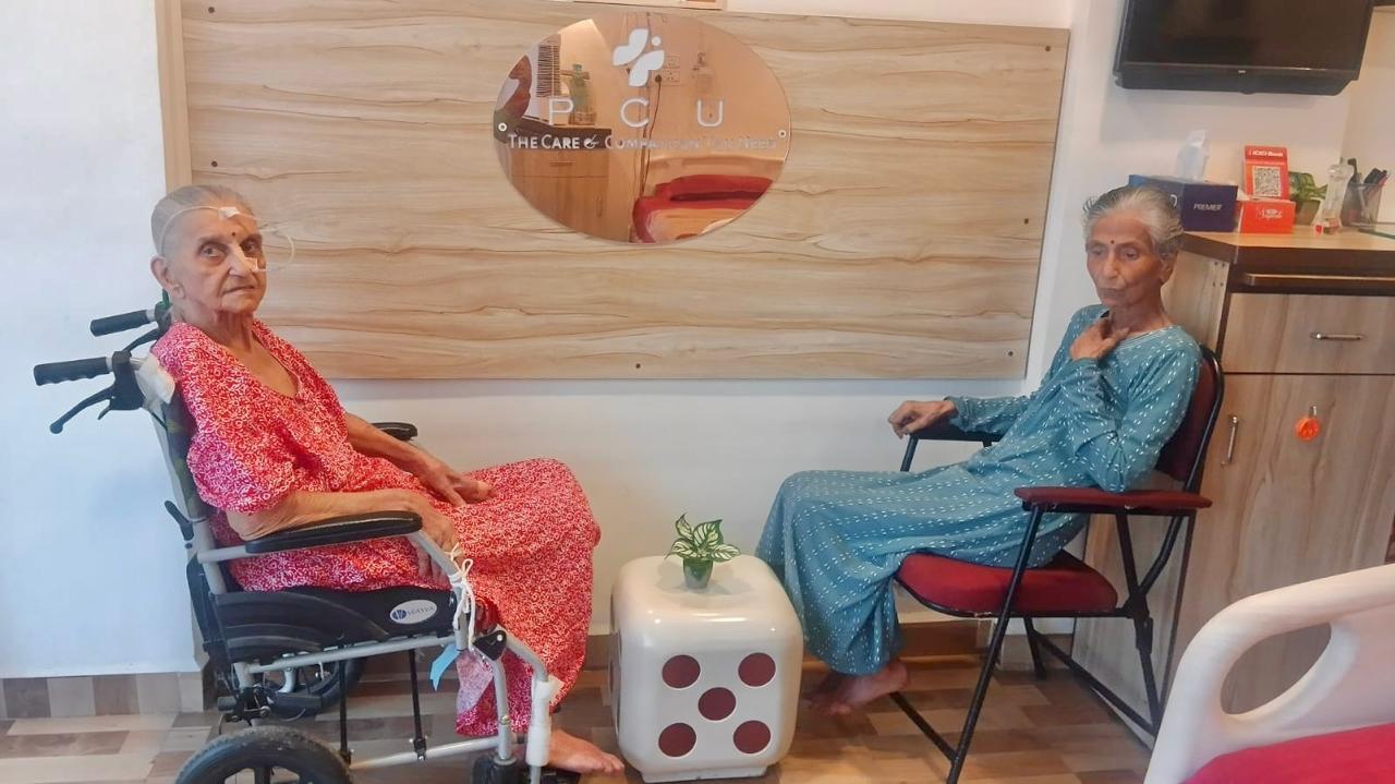 Senior residents relaxing together in the P.C.U lounge